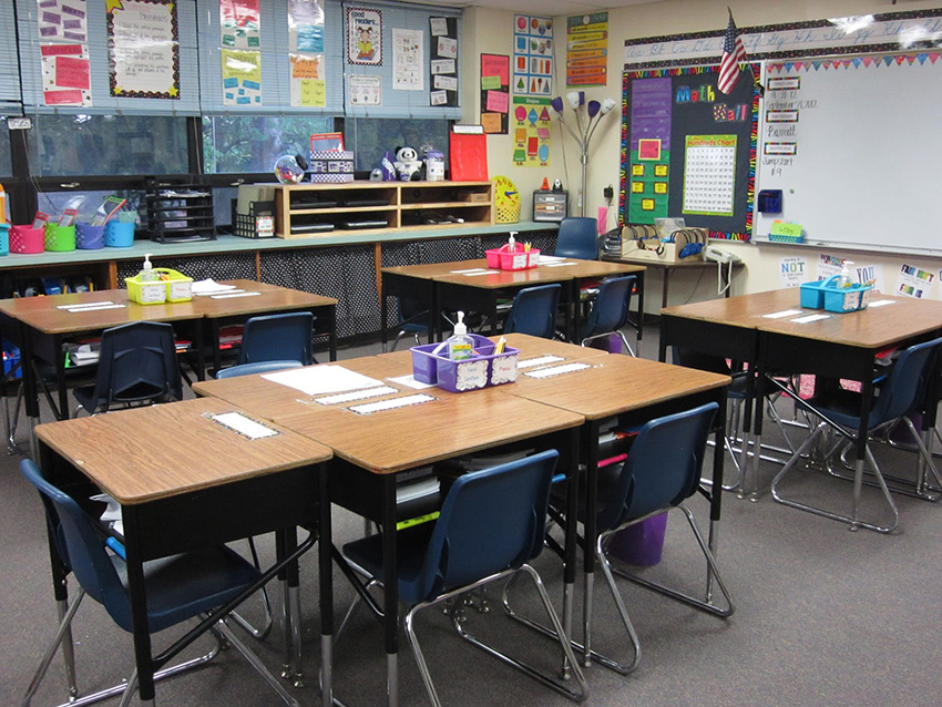 A third grade classroom with desks in view