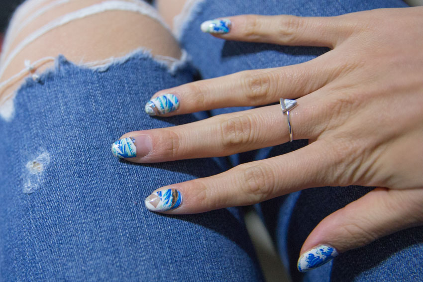 Close up shot of my ocean-patterned nail wraps