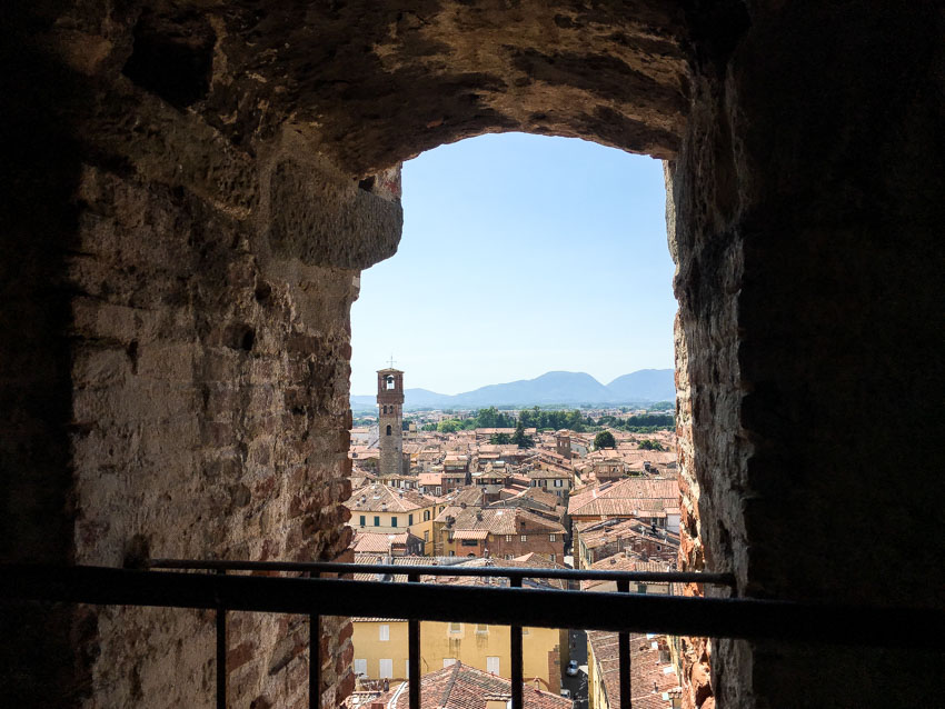 View of Lucca from a stone window in the Guinigi Tower