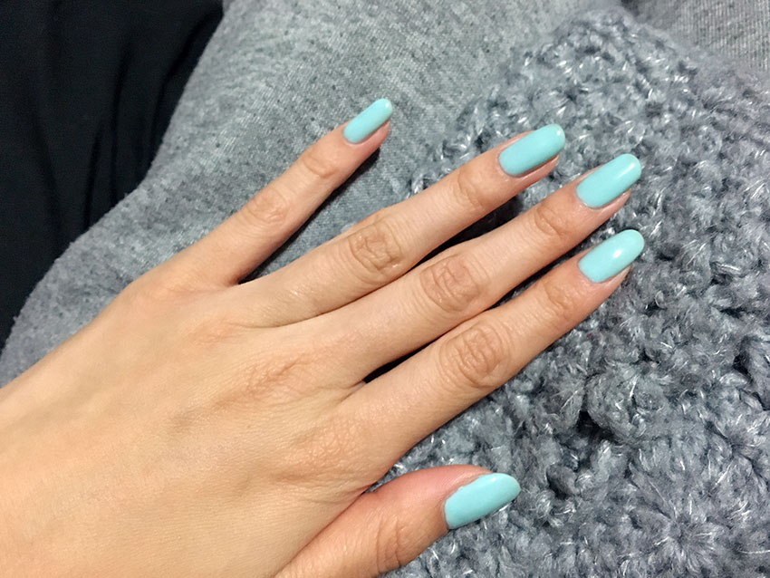 My nails painted a light baby blue