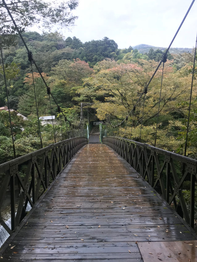 A rope bridge that went over a waterway and led to the ryokan we were staying in