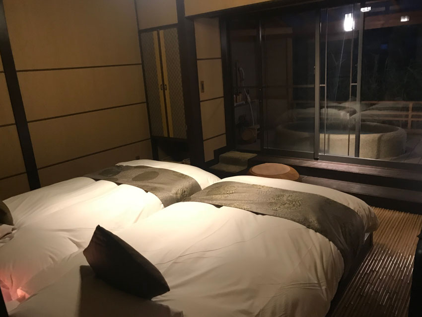 Two separate large beds in our ryokan room