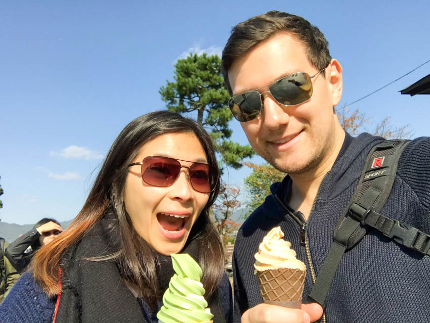 Me and Nick smiling with matcha (green tea) ice cream and caramel ice cream, respectively
