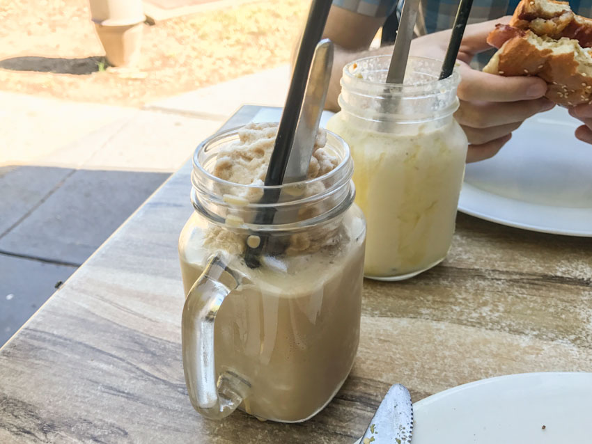 Iced chai in a square jar with a handle