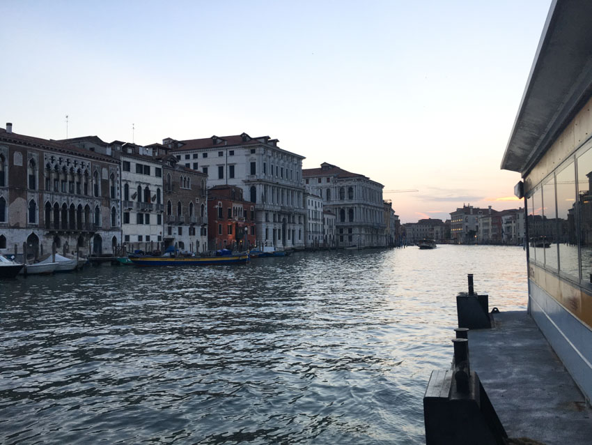 A view of Venice in the late evening, taken from a vaporetto stop