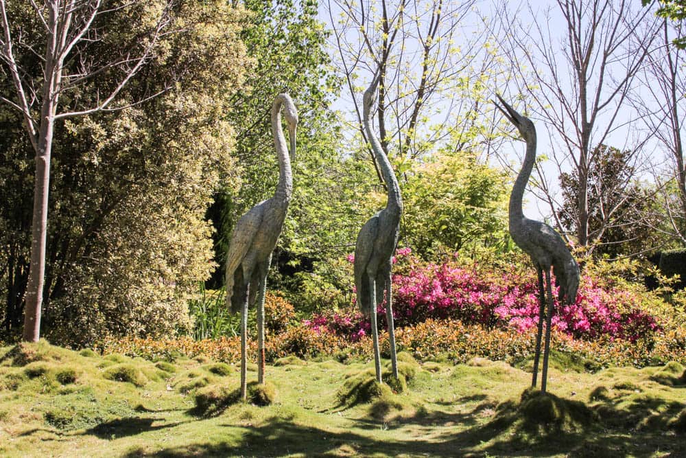 Three bird statues