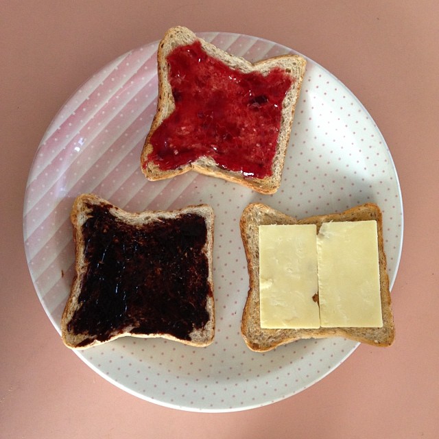 Breakfast: strawberry jam, Vegemite and cheese on toast