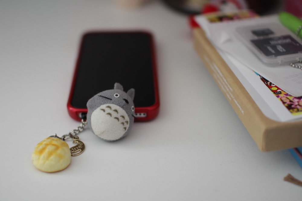 Totoro on my phone. And a melon pan (bread bun)