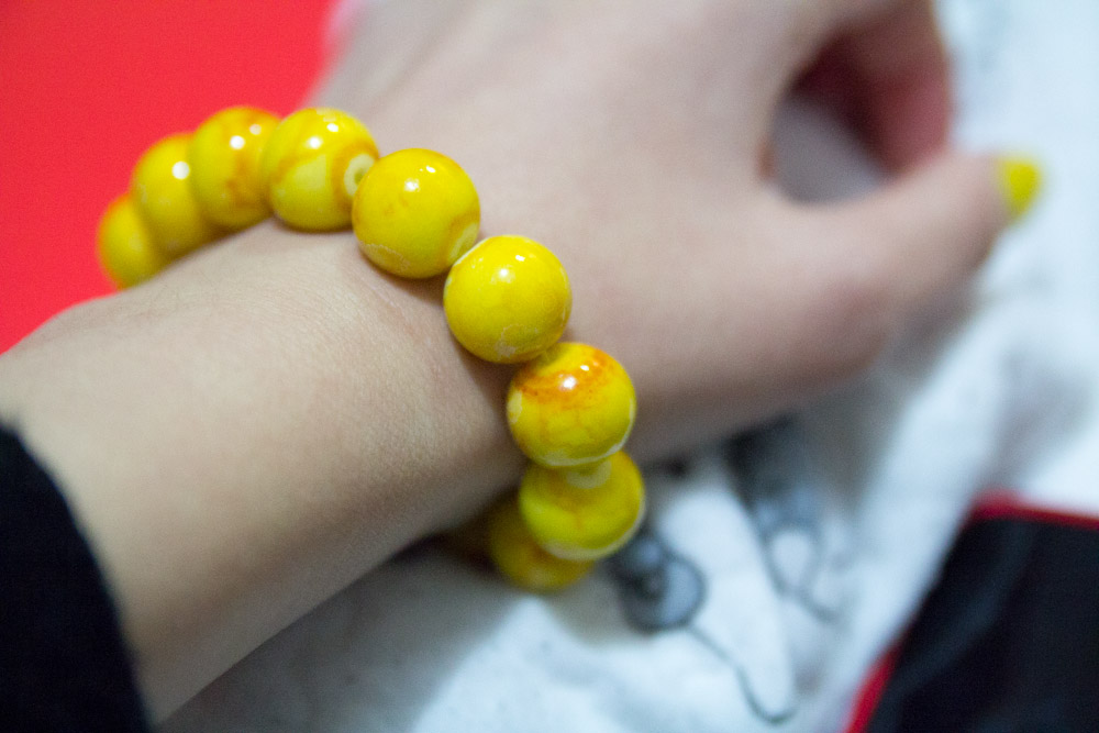 Bright yellow beaded bracelet