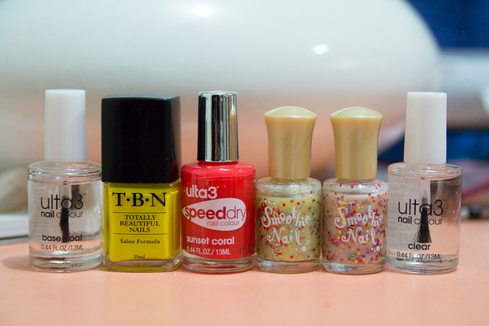 Ulta3 base coat; TBN in fluoro yellow, Ulta3 Speed Dry in Sunset Coral; Smoothie Nail (two variations); Ulta3 in Clear