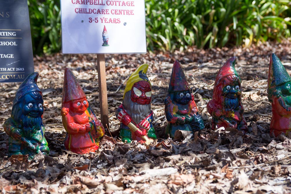 Some garden gnomes painted by children