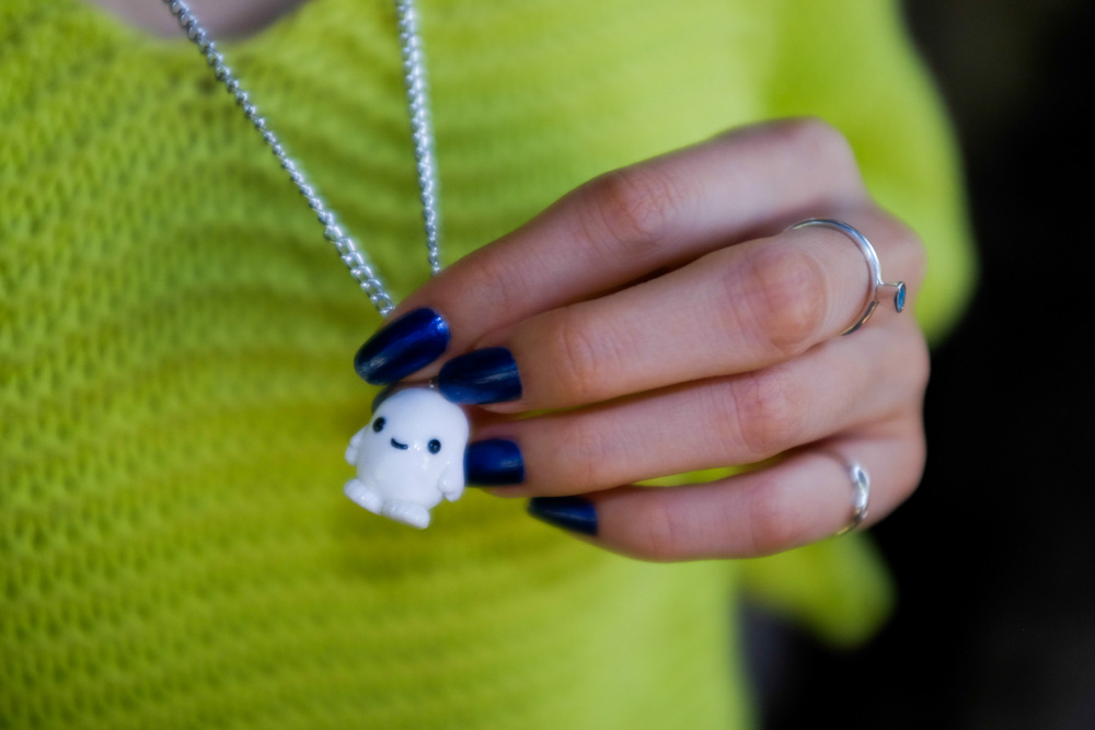 Adipose necklace and blue nails