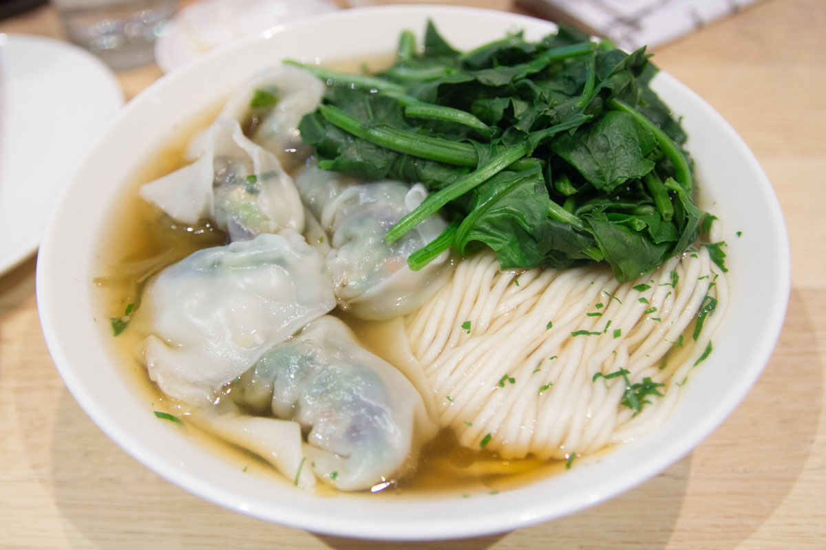 Vegetarian dumplings with noodles and spinach