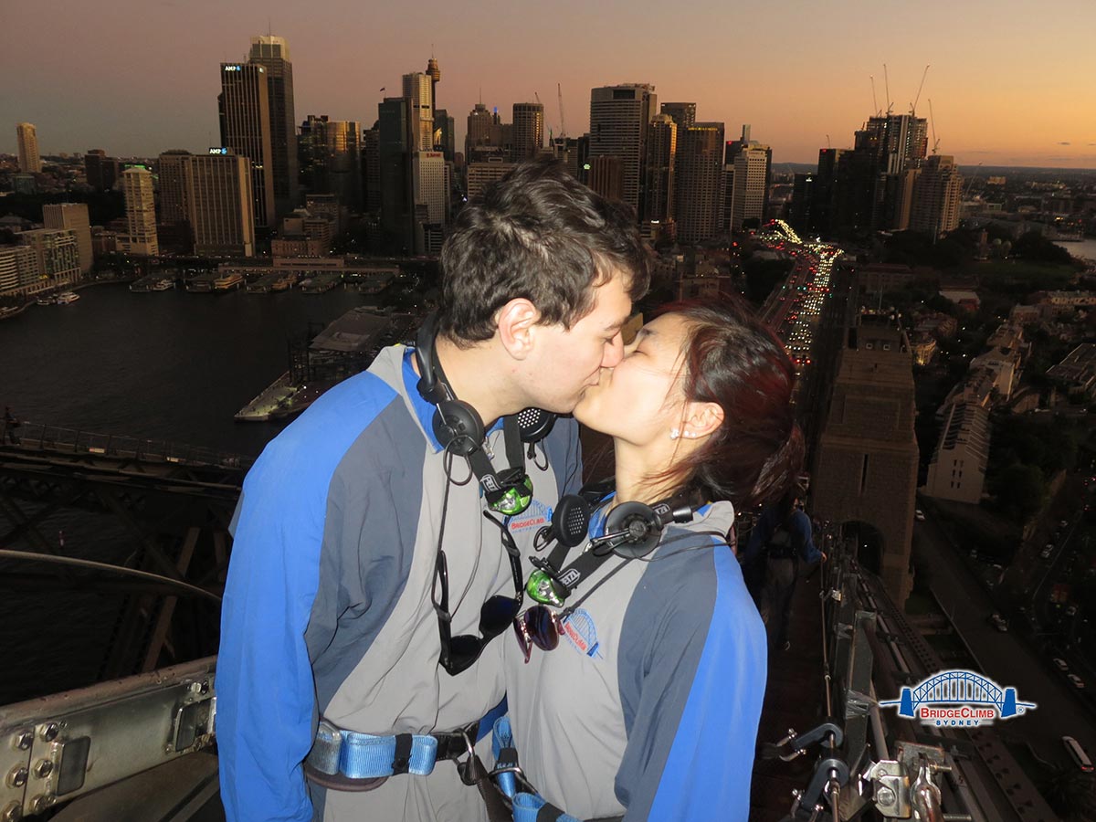 Nick and I kissing on top of the bridge