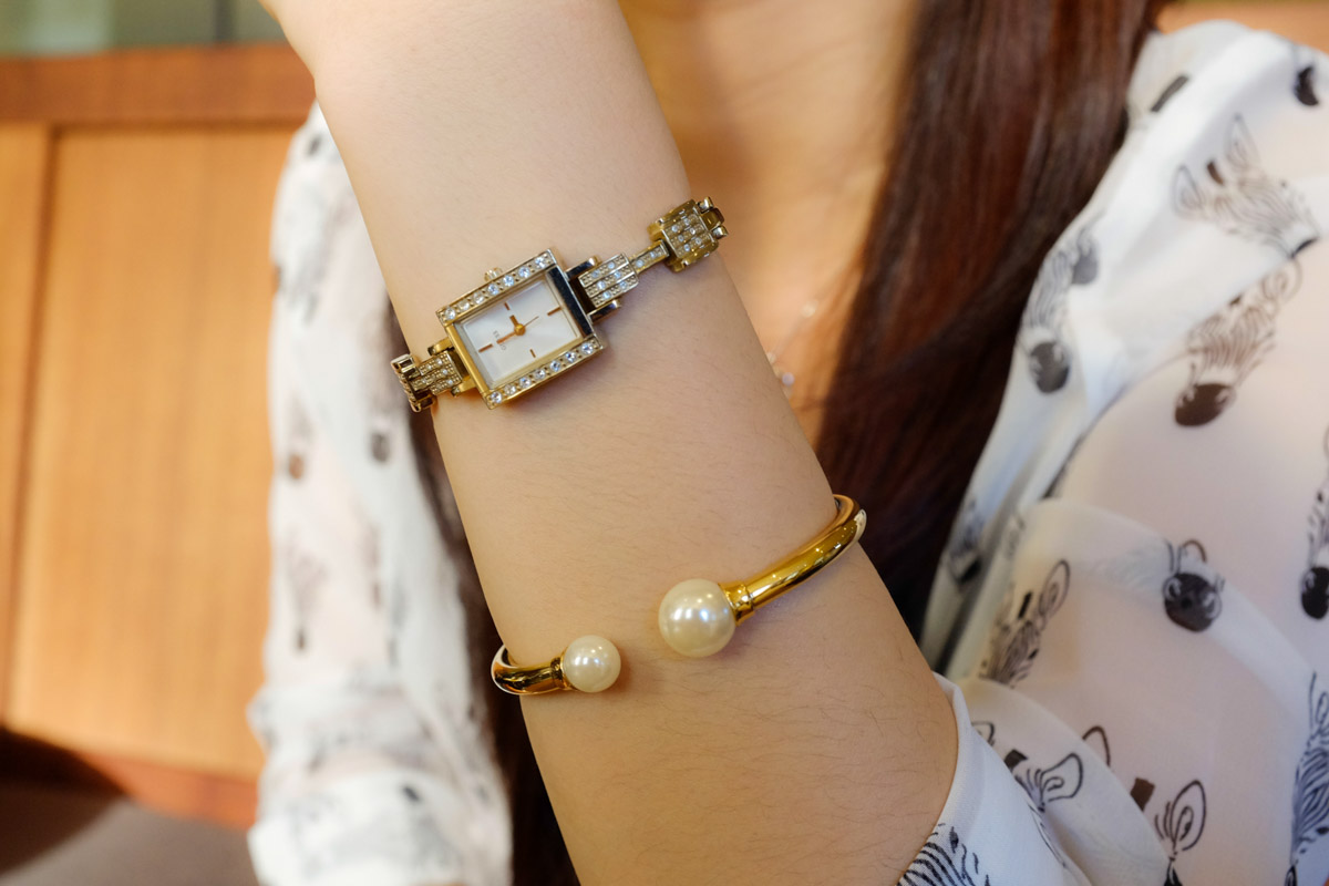 Pearl bangle and Guess watch