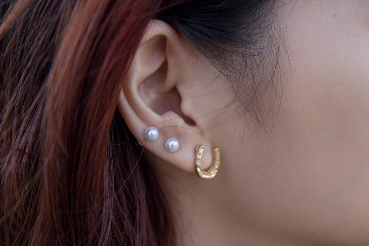 Horseshoe and pearl earrings