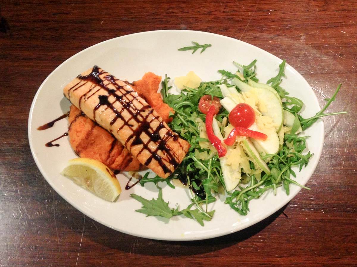 Salmon with pumpkin and parmesan salad