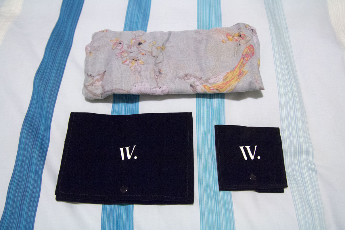 The jewellery pouches and the folded scarf