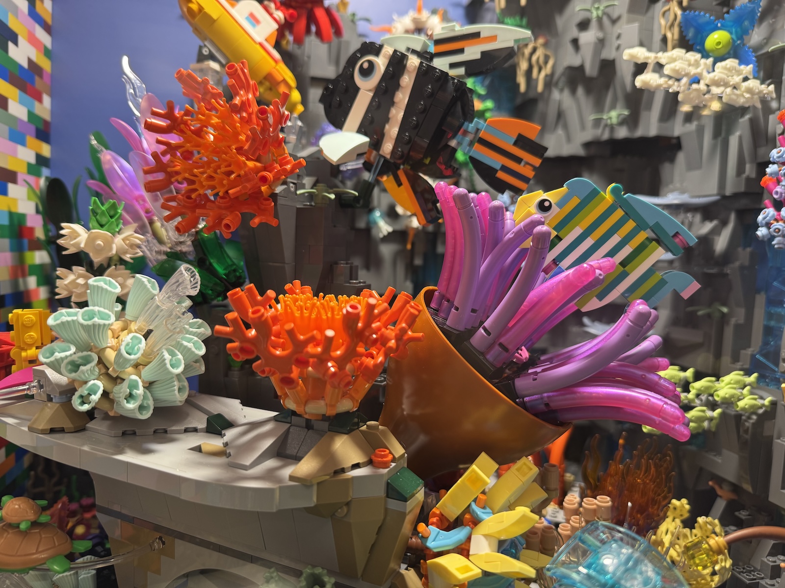 Colorful LEGO-style coral, sea creatures, and underwater plants arranged in an elaborate display.