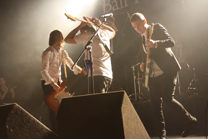 Brock, Dean, and Lindsay McDougall battling it off in a guitar competition