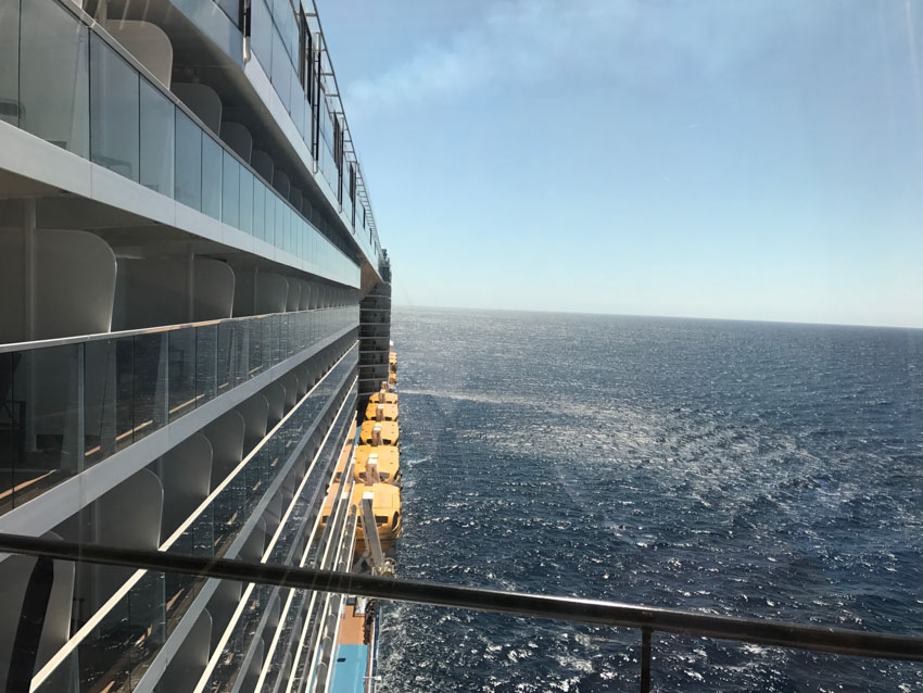 A view of the side of the ship, from the bridge at the front