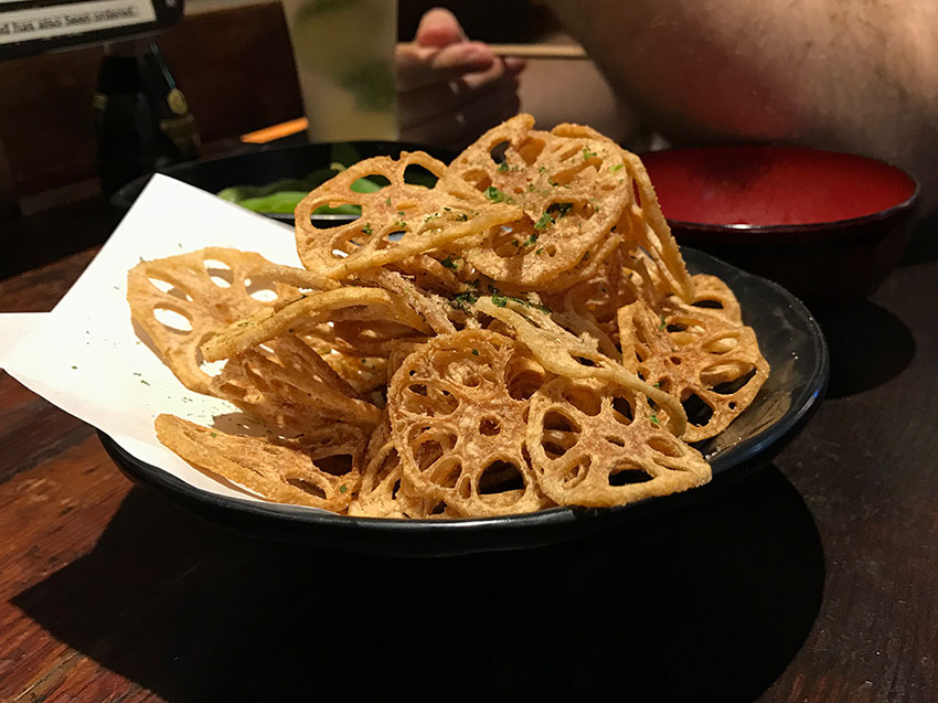 Seasoned lotus root chips in a bowl