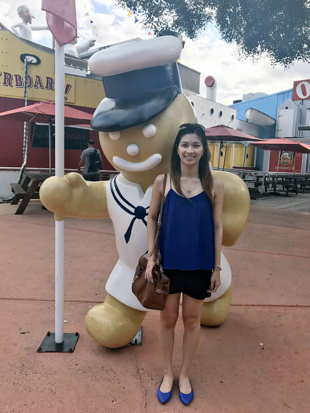 Me in front of a gingerbread statue at the Ginger Factory