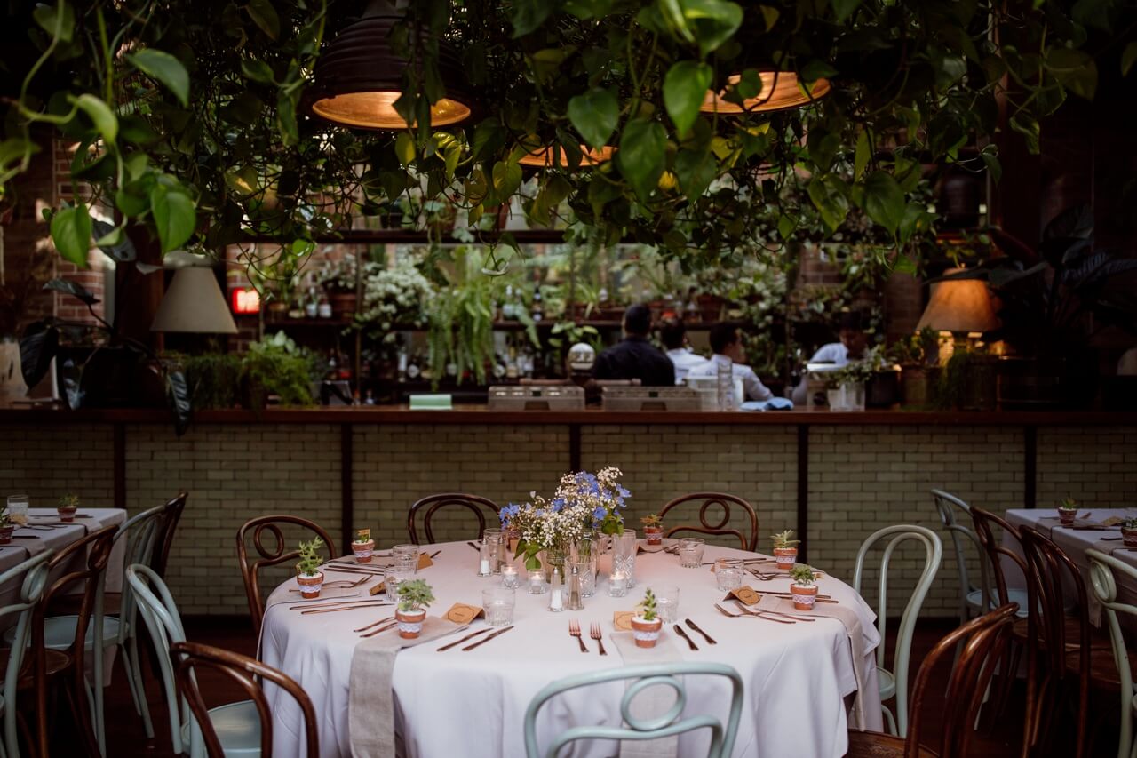 A few tables set up for a wedding