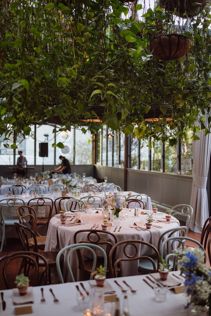 A few tables set up for a wedding