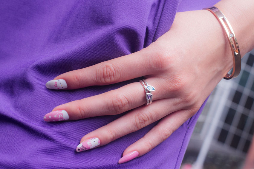 A close up of my thumb in my pocket, showing my nails