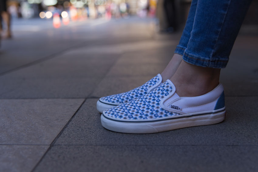 Close up side shot of my shoes with the streets in the background