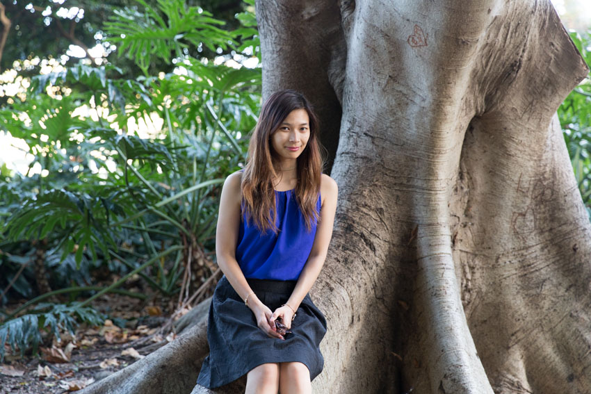 Me sitting at the large roots of a tree