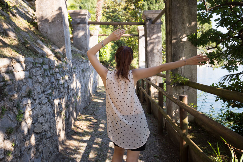 Me with my back to the camera, arms in air with hands pointed to my right