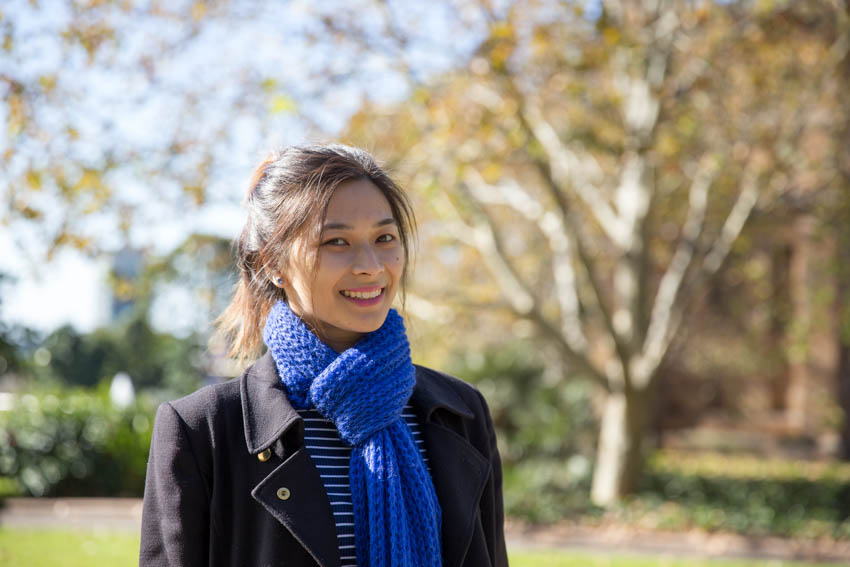 Medium shot of me smiling against a nice blurred background reminiscent of autumn