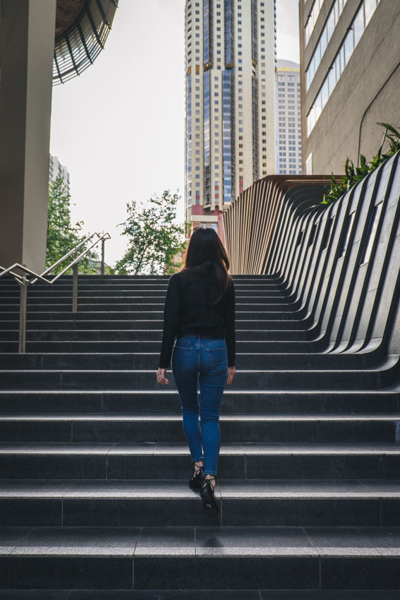 Back view of me walking up the set of steps