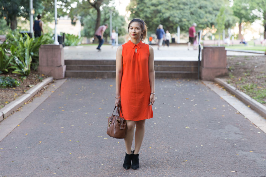 Full body shot of me standing in Hyde Park with my bag in my hand