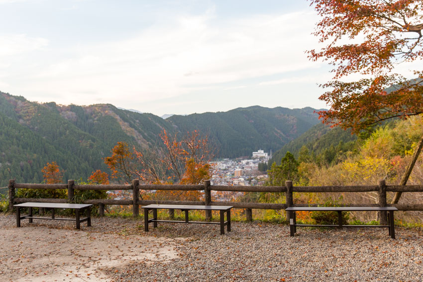 Some wooden benches before the entrance to the castle