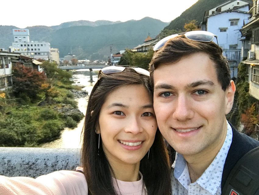 A selfie of me and Nick with the Yoshida River in the background