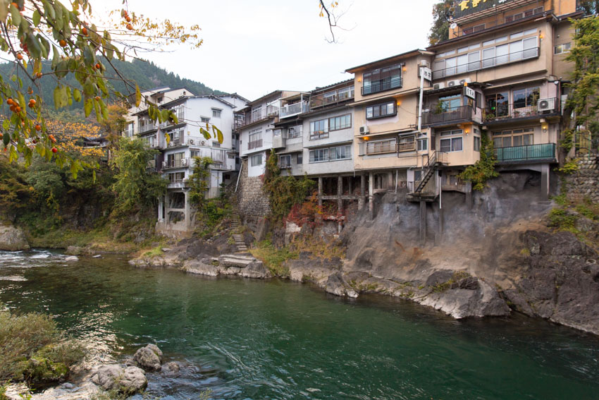 Some houses just above the river, with stone steps leading all the way down to the water’s edge