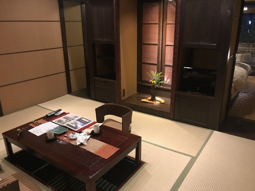 The main entrance of our room with the dining table and cabinet in view