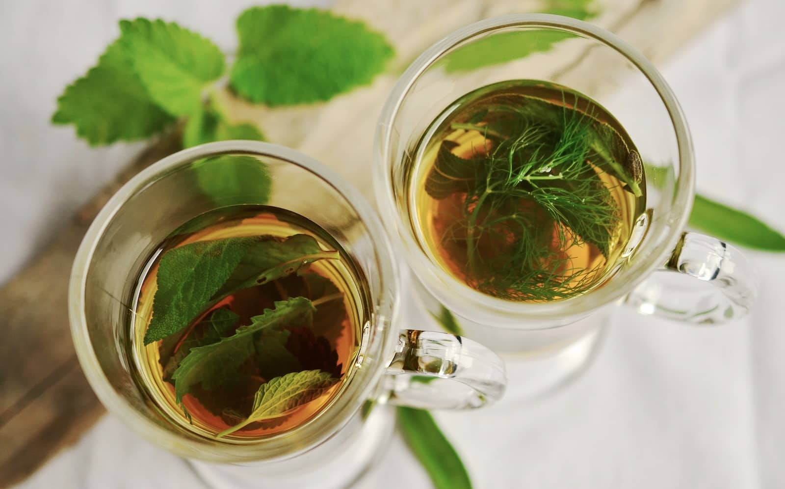 Herbal tea served in two glasses, taken from above