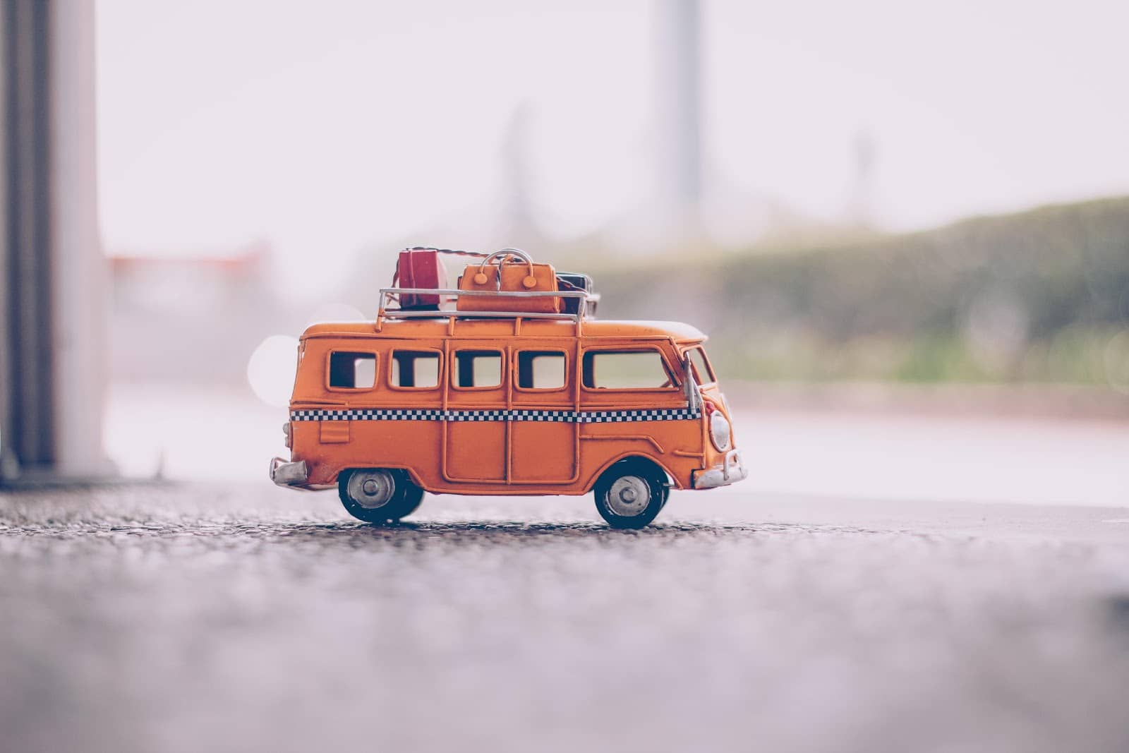 A small orange model car in a close shot