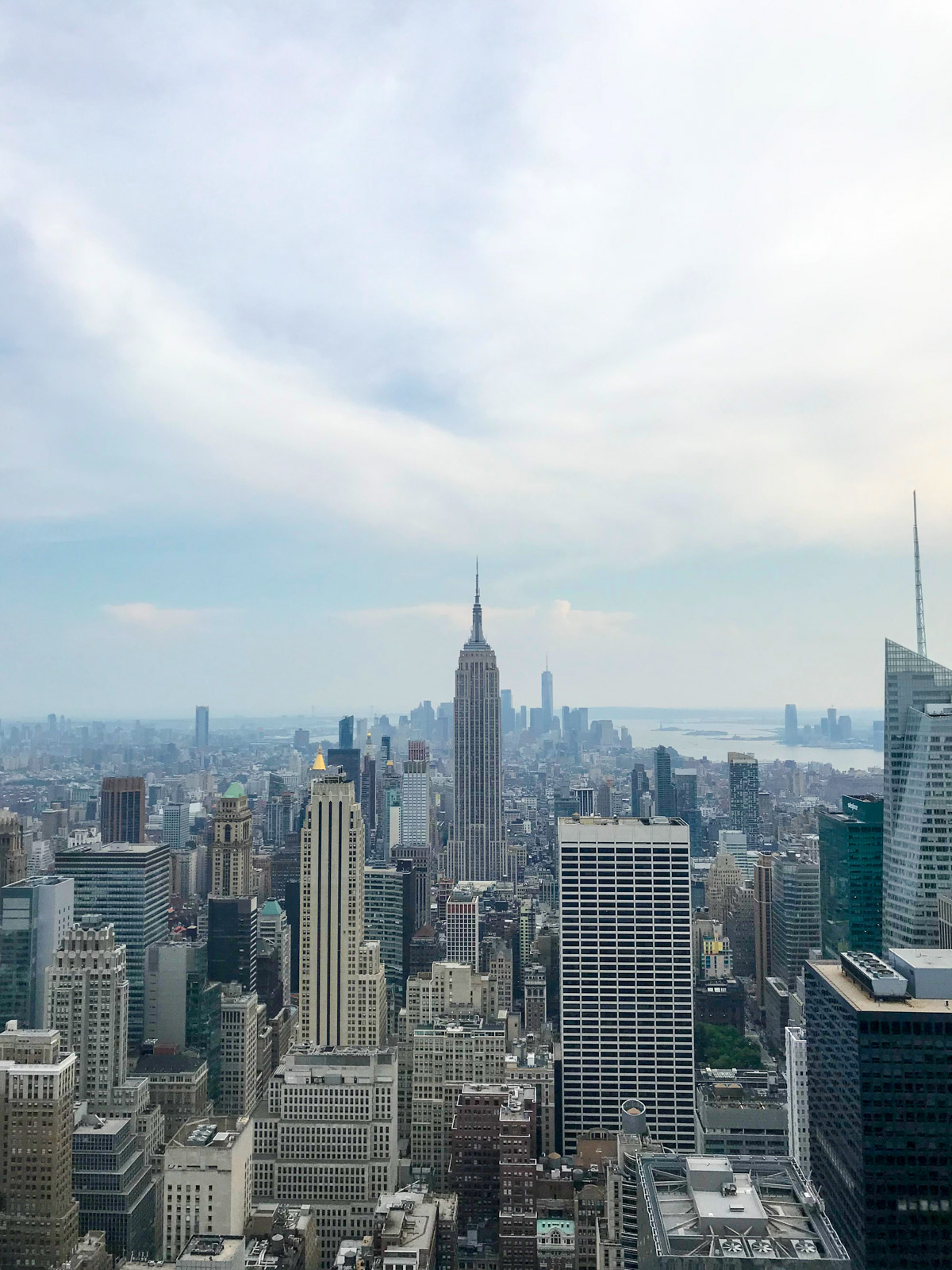 A view of New York City with the Empire State Building in the centre of frame