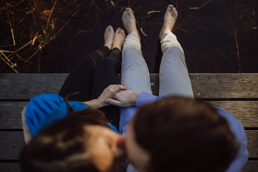 Nick and I holding hands and kissing – shot from above