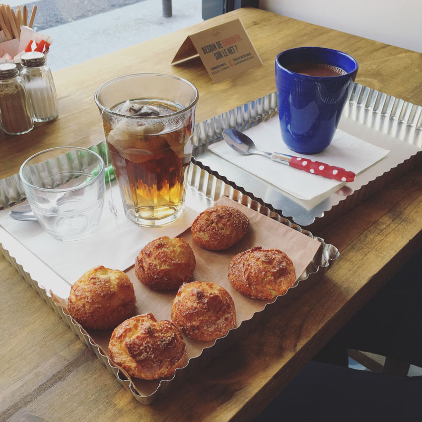 Dough balls of different flavours, with hot chocolate and tea