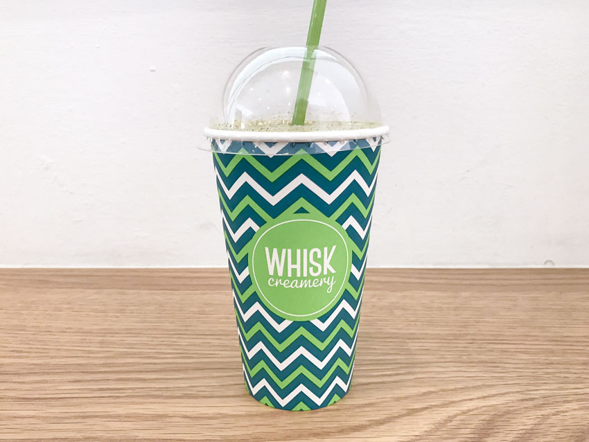 A takeaway cup of milkshake from Whisk