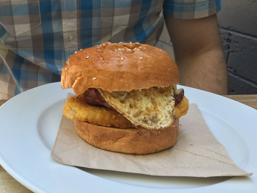 The burger Nick ordered, with bacon, a hash brown, fried egg and barbecue sauce