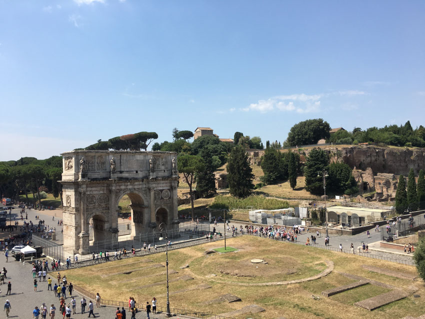 A stone arch visible from inside the Colosseum