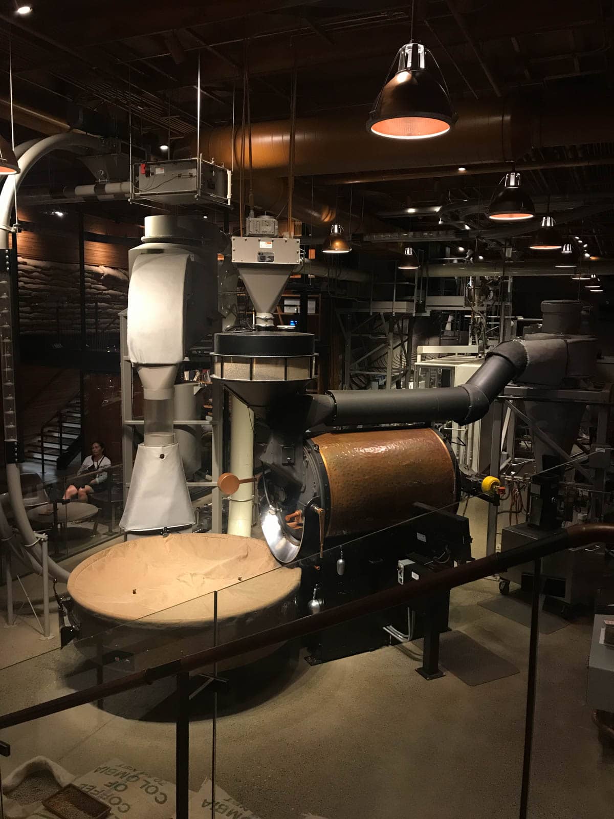 Big machinery inside of a coffee roastery.