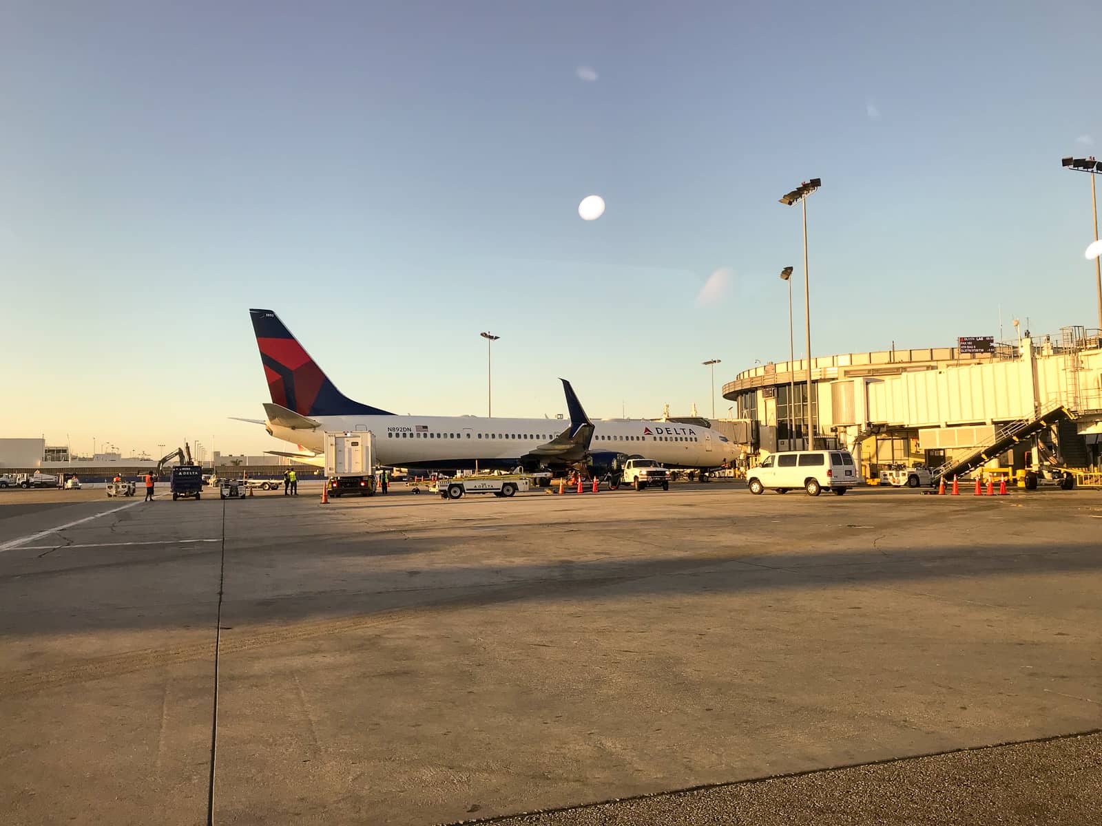 A Delta plane on the airport tarmac, shortly after sunrise